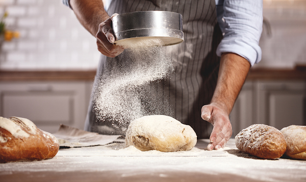 Hands Of Baker's Male Knead Dough